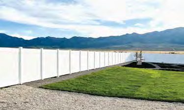 White vinyl fence with mountain and lake view